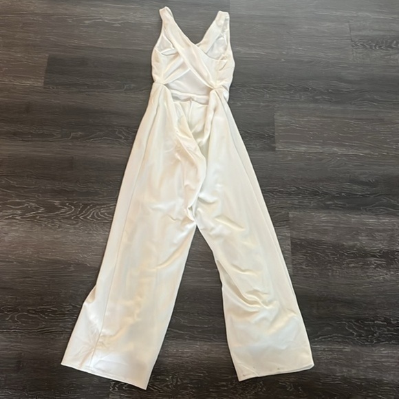 Crystal Sky sleeveless romper - Picture 1 of 3